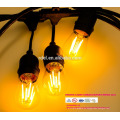 Luces de cuerda al aire libre iluminadas con iluminación comercial de filamentos de Edison - Cuerdas de 48 pies para trabajos pesados ​​18 zócalos 21 bombillas incandescentes (3 spa
